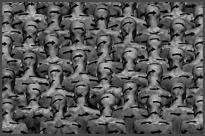 A crowd of identical grey faces