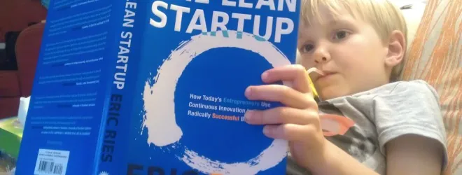 A child reading The Lean Startup by Eric Ries
